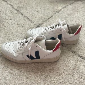 Lightly won vejas, red on the back, navy blue V!